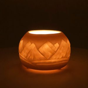Candle holder - carved porcelain
